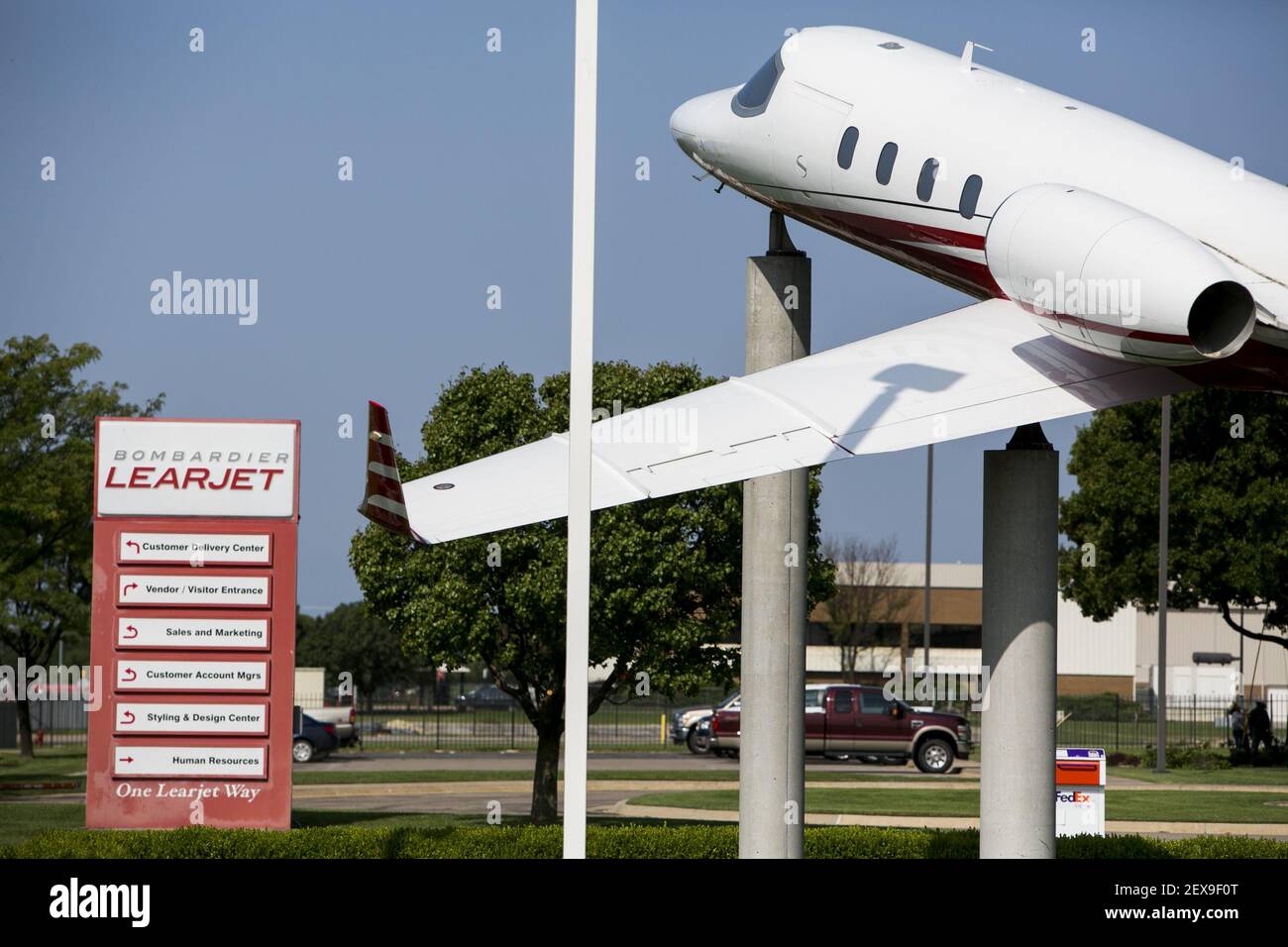 A logo sign outside of the headquarters of the Bombardier Learjet