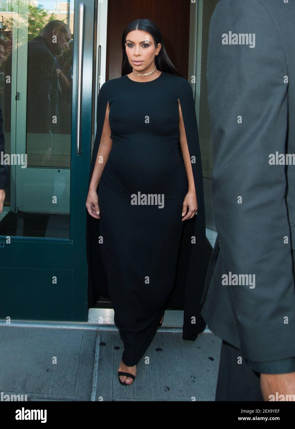 Kim Kardashian leaving her apartment in a Long black form fitting dress in New York, on September 6, 2015. (Photo by Enzo Henry) *** Please Use Credit from Credit Field *** Stock Photo - Alamy Kim Kardashian leaving her apartment in a Long black form fitting dress in New York, on September 6, 2015. (Photo by Enzo Henry) *** Please Use Credit from Credit Field *** Stock Photo - Alamy