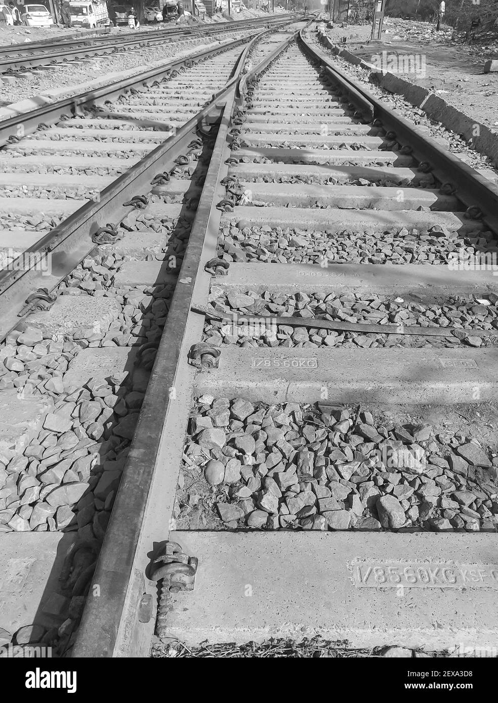 View of Railway Tracks from the middle during day time in Delhi India, Indian Railways track