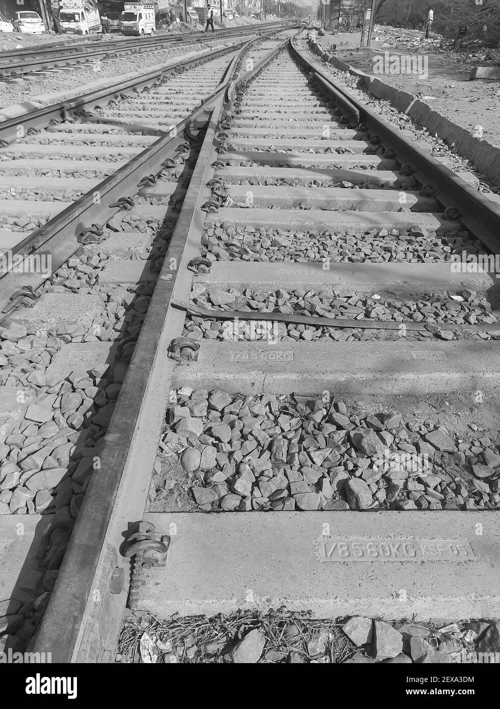 View of Railway Tracks from the middle during day time in Delhi India, Indian Railways track