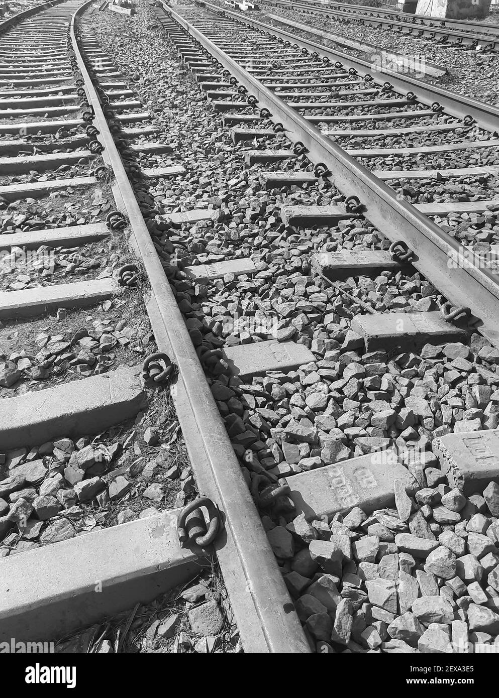 View of Railway Tracks from the middle during day time in Delhi India