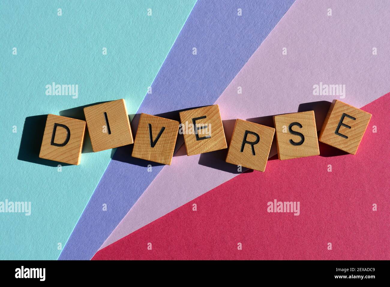 Diverse, word in wooden alphabet letters isolated on colourful ...