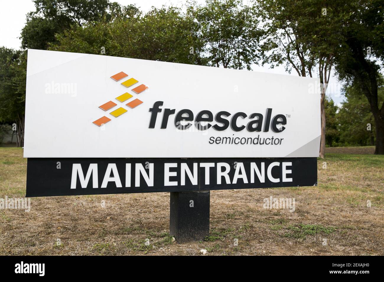 A logo sign outside of the headquarters of Freescale Semiconductor Inc ...