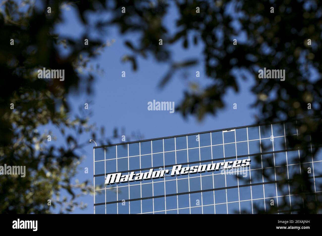 A logo sign outside of the headquarters of The Matador Resources Company in Dallas, Texas on