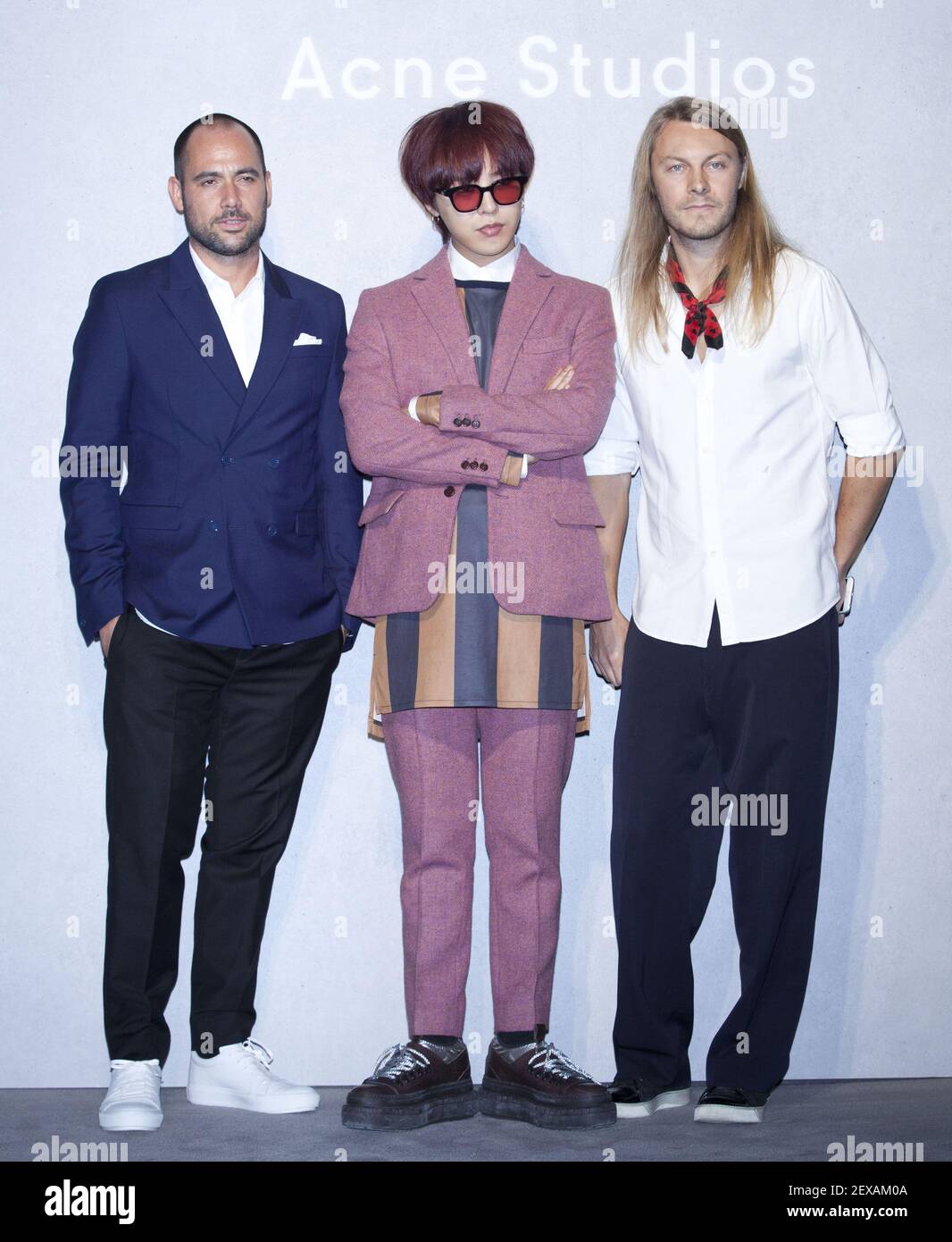 18 September 2015 - Seoul, South Korea : (L to R) Swedish Mikael Schiller,  Chairman of luxury fashion house Acne Studio Corp,. South Korean G.Dragon,  member of K-Pop boys band Big Bang