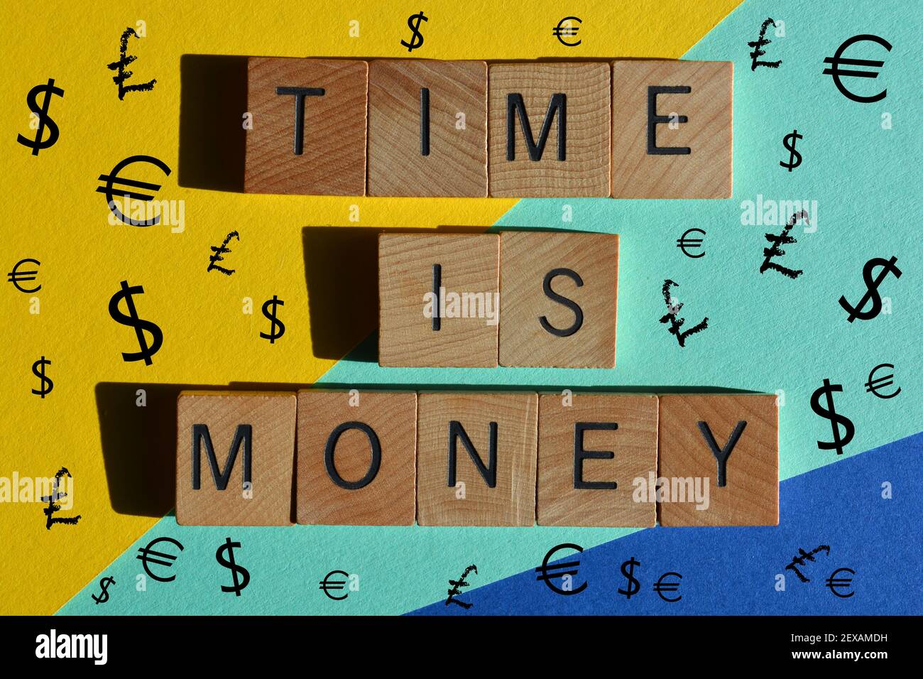 Time Is Money, words in wooden alphabet letters on colourful background