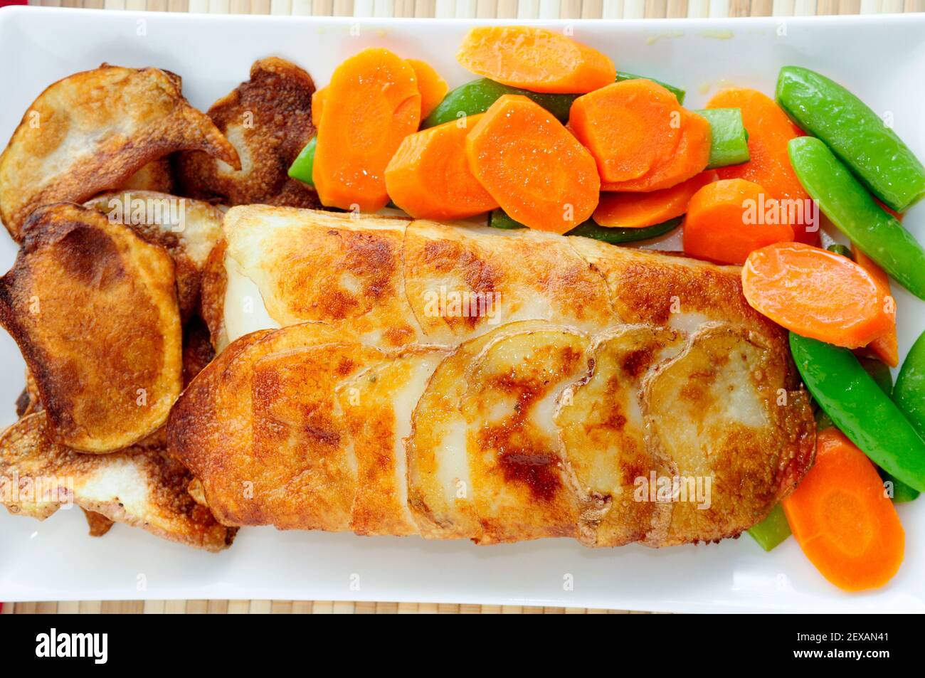 vegetables and potato wrapped halibut fish fillets Stock Photo Alamy