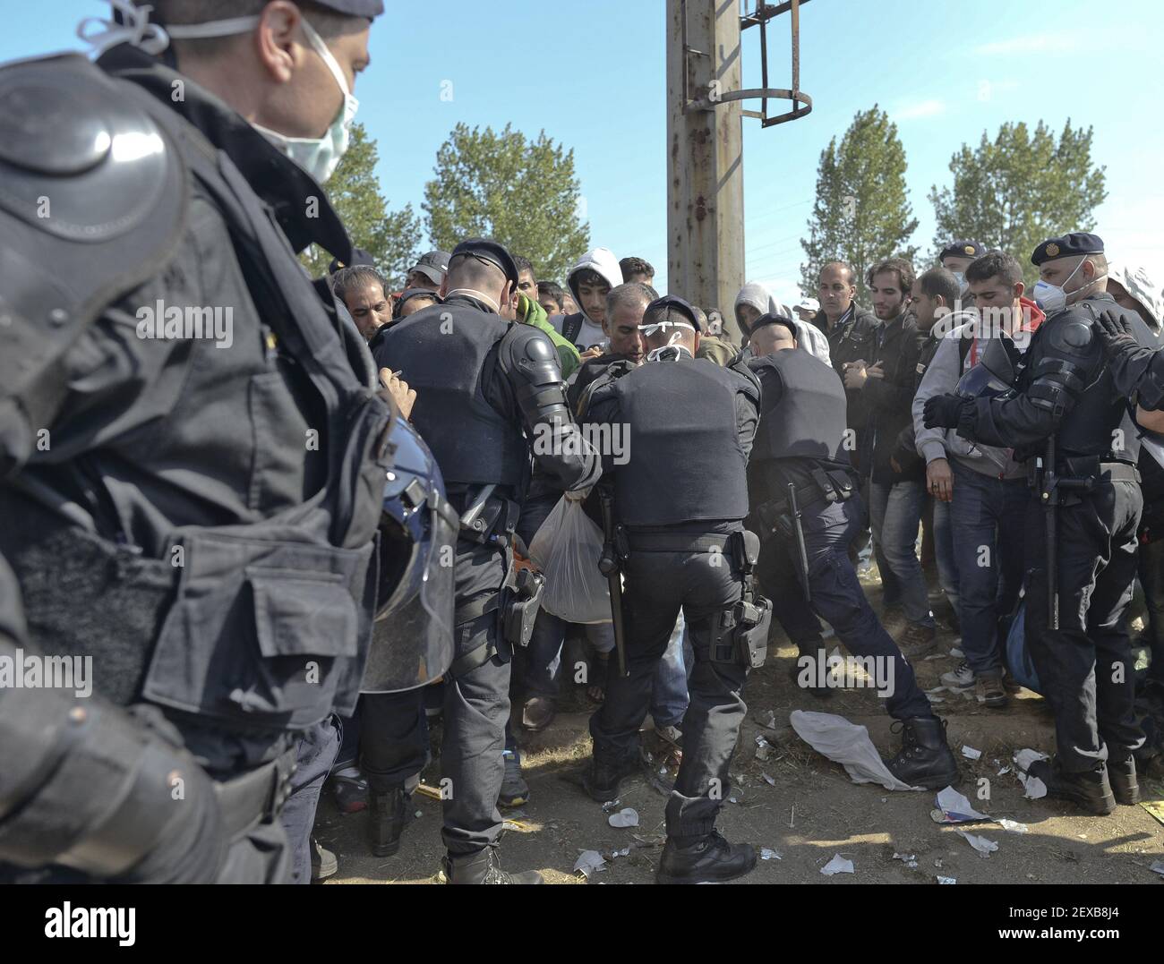 Croatian Riot Police is protecting the transfer camp gate in Opatovac near border crossing point