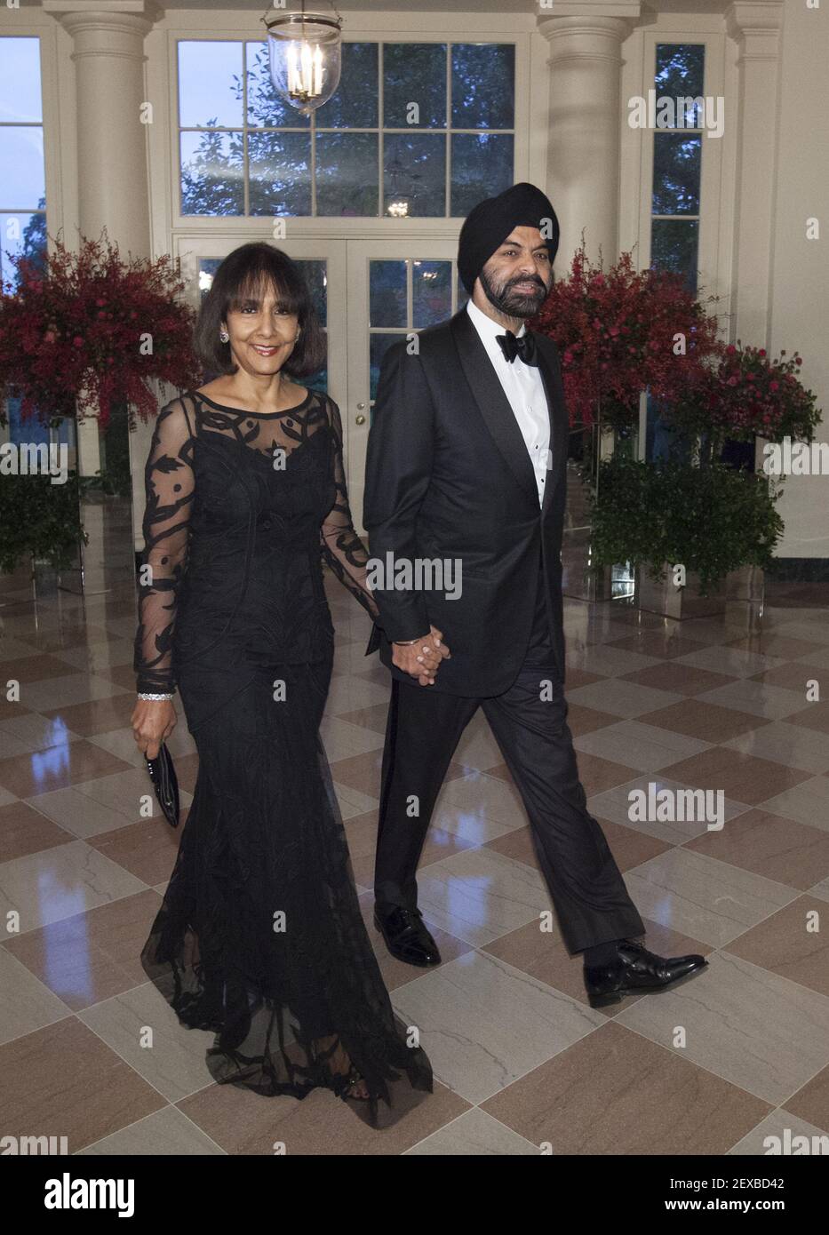 Ajay Banga, President and CEO, Mastercard and Mrs. Ritu Banga arrive at the  State Dinner for China's President President Xi and Madame Peng Liyuan at  the White House in Washington, DC for