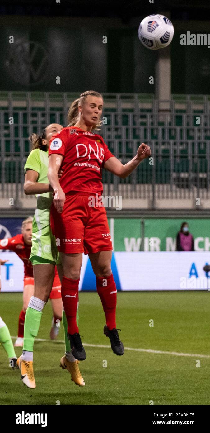 Nora Eide Lie (#8 LSK Kvinner) jumps for a header during the match in the