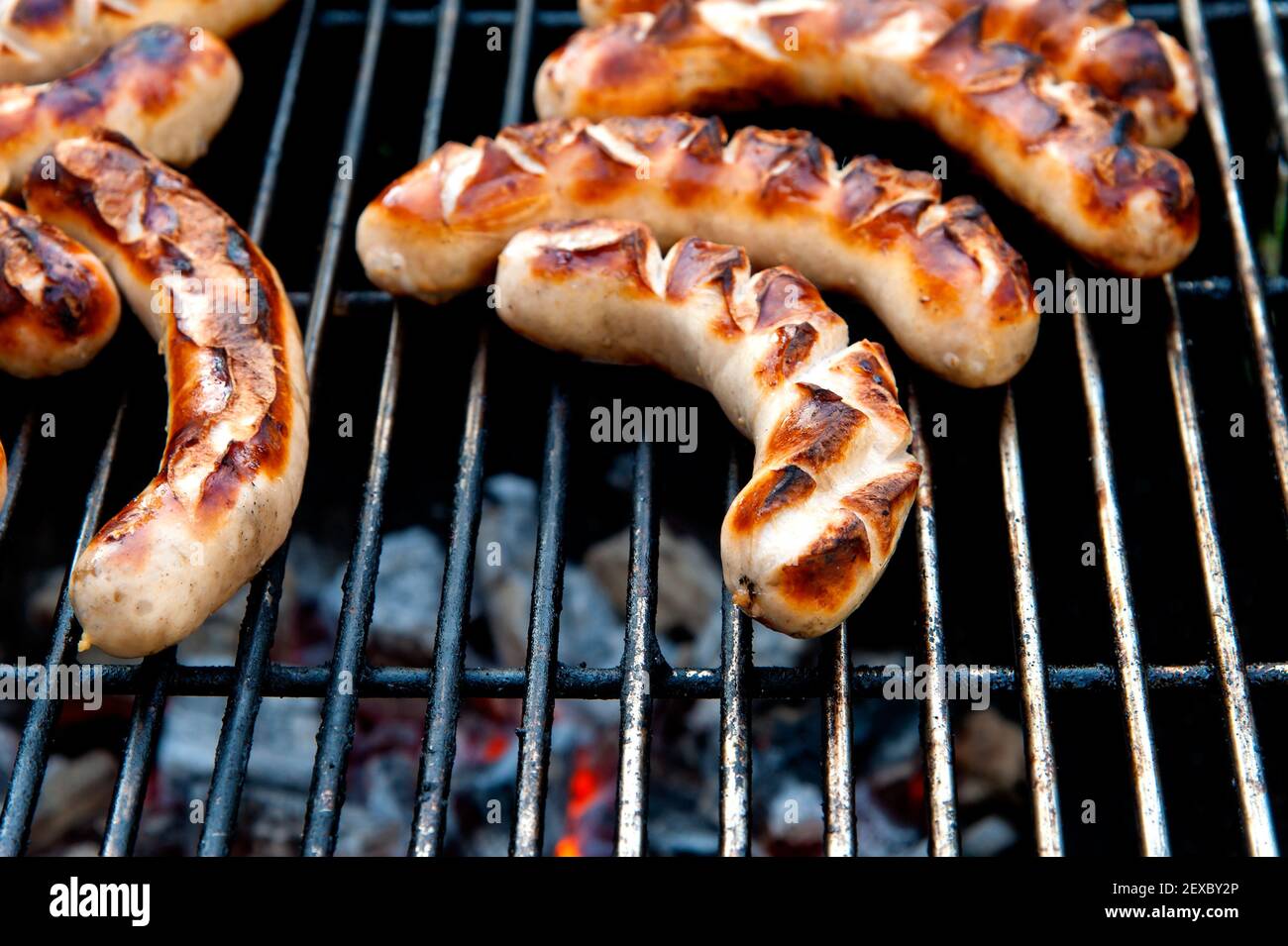 Delicious german Bratwurst on barbecue grill Stock Photo Alamy