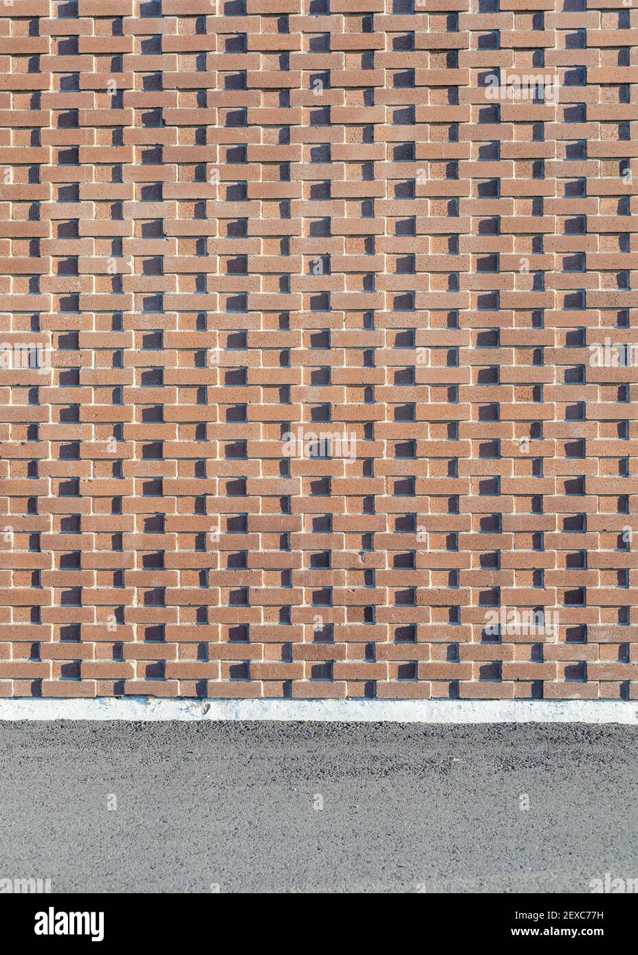 Red brick wall texture background. School building wall. Stock Photo