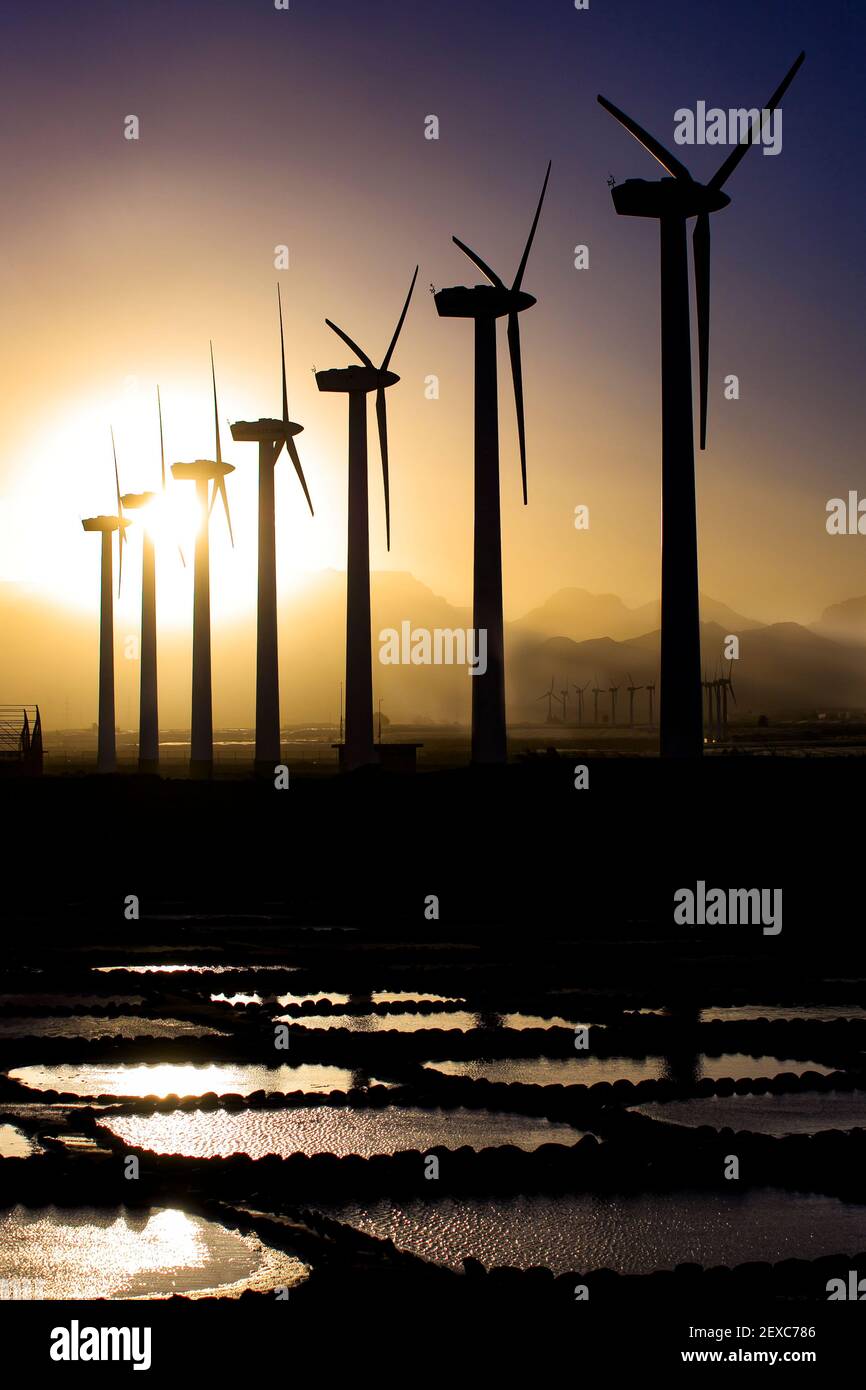 windmills at sunset in the salt flats Stock Photo