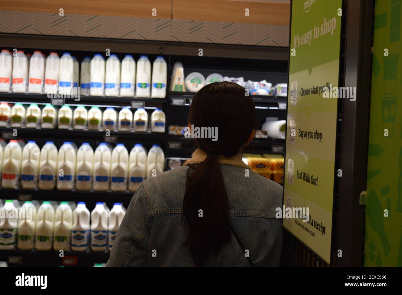 London, UK. 5 March 2021. Shopper's inside the Amazon Fresh first till