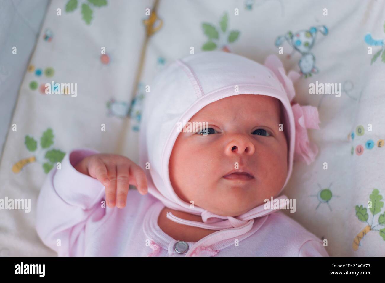 Adorable white newborn baby girl Stock Photo