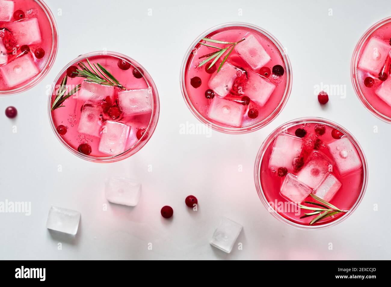 Cranberry rosemary spritzer drink on a light background. Stock Photo