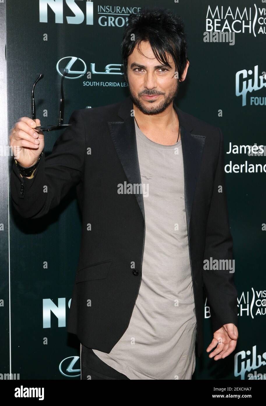 MIAMI BEACH,FL - OCT 15: Beto Cuevas arrives at the Latin Songwriters