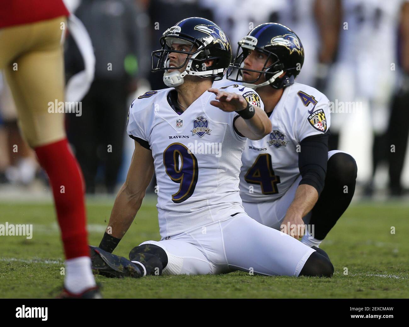 Baltimore Ravens' Justin Tucker (9) slips after a field goal