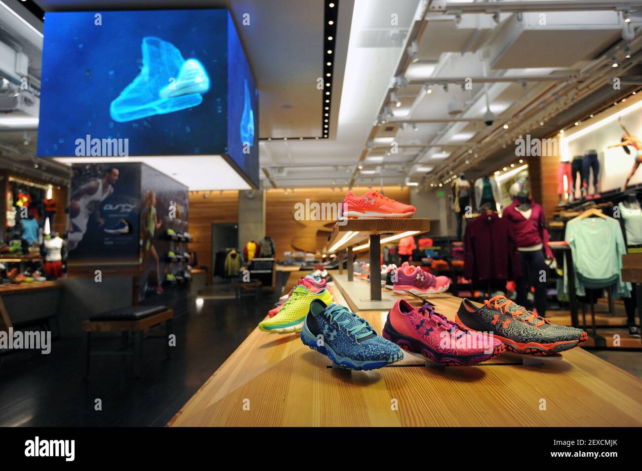 The women's shoe display at the Under Armour Brand House in Harbor East in  Baltimore. A new Under Armour initiative aims to someday make more of its  products locally. (Photo by Kim