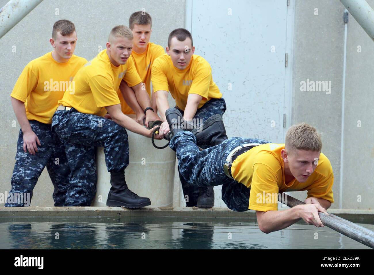 AMES, Iowa (Sept. 19,2015) Iowa State University Naval ROTC midshipmen work together and use learned leadership skills to make it through the Leadership Reaction Course during New Student Orientation. (Photo by U.S. Navy) 150919-N-ZZ999-908 *** Please Use Credit from Credit Field *** Stock Photo