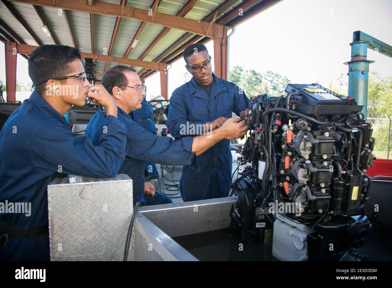 STENNIS SPACE CENTER, Miss. (Sept. 14, 2015) International students work on an outboard motor as