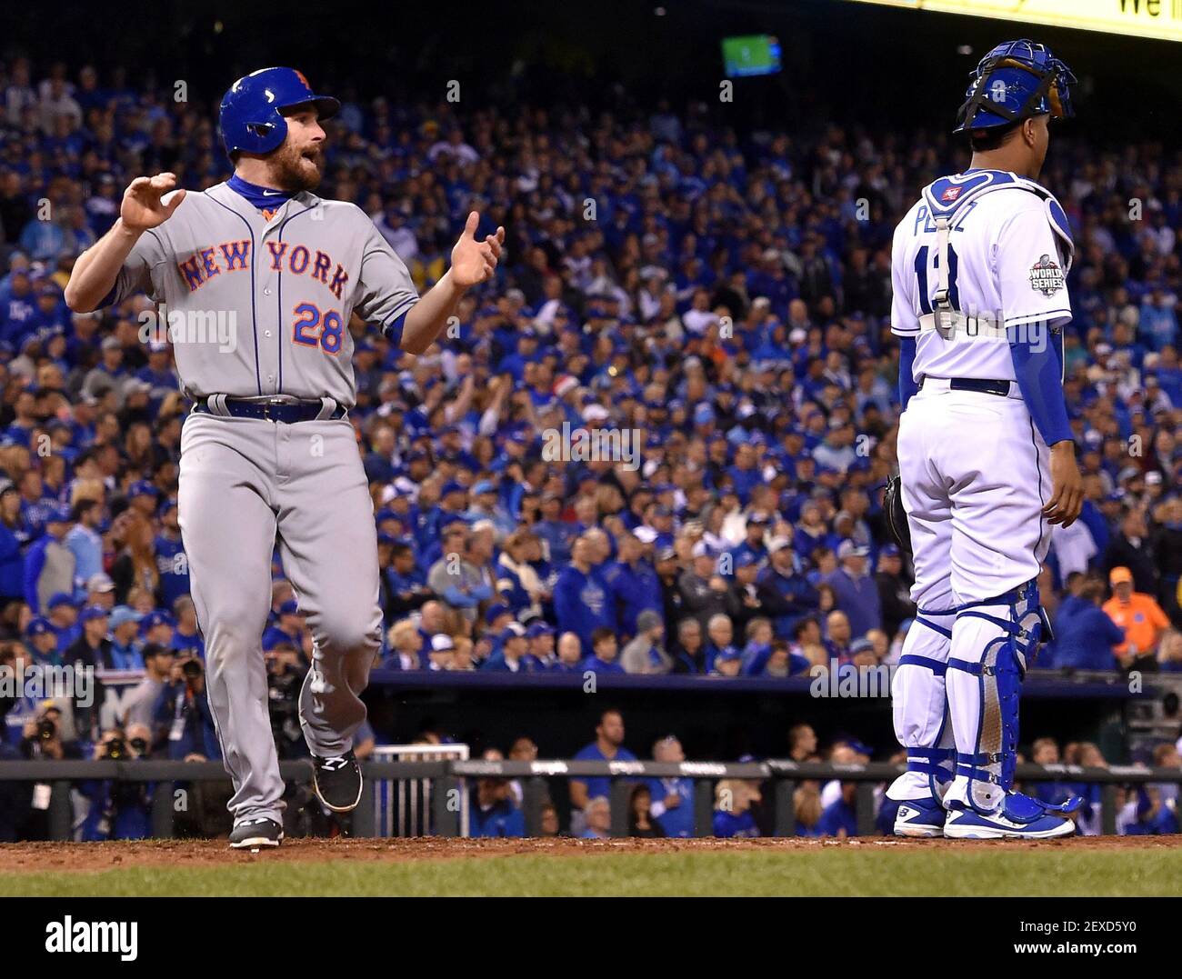 National League All-Star Daniel Murphy, of the New York Mets, walks off the  field after striking out to end the eighth inning of the 2014 MLB All Star  Game against the American