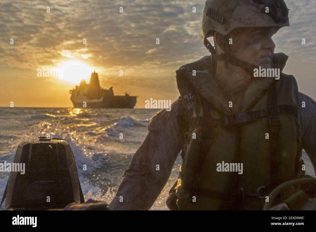 U.S. Marine Corps Lance Cpl. Chance Seckenger with Company F, Battalion Landing Team 2nd Battalion, 5th Marines, 31st Marine Expeditionary Unit (MEU), rides in a Combat Rubber Raiding Craft during launch and recovery drills from the well deck of the USS Green Bay (LPD-20), at sea, July 9, 2015. Talisman Sabre is a major bilateral exercise that enhances the combat readiness and interoperability of U.S. and Australian forces across a range of military operations. (Photo by Lance Cpl. Brian Bekkala/U.S. Marine Corps) *** Please Use Credit from Credit Field *** Stock Photo