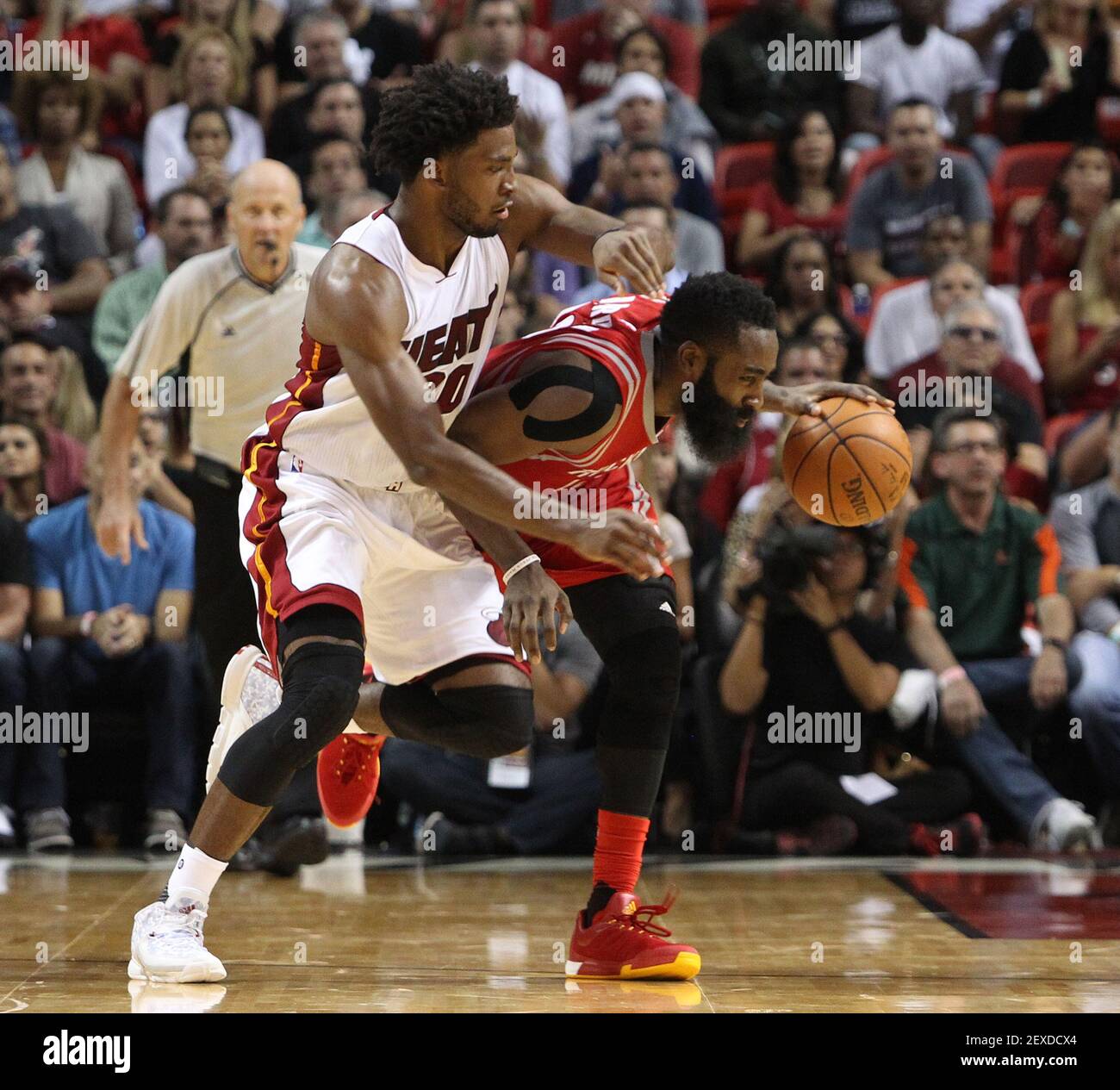 Miami Heat's Justise Winslow guards Houston Rockets' James Harden