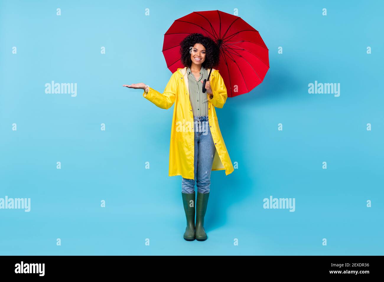 Full body photo of young afro woman happy positive smile wear raincoat