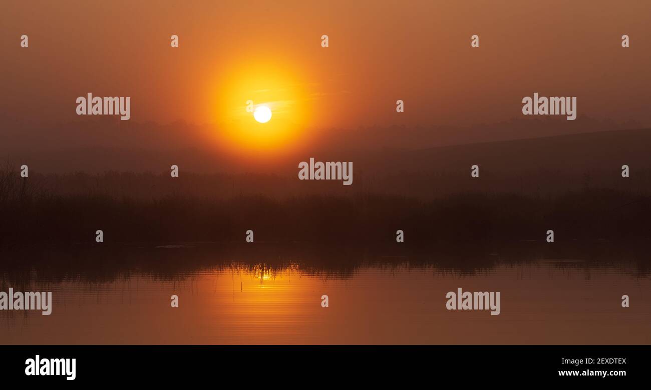 Autumn sunrise over a wilderness lake in northern Wisconsin Stock Photo ...