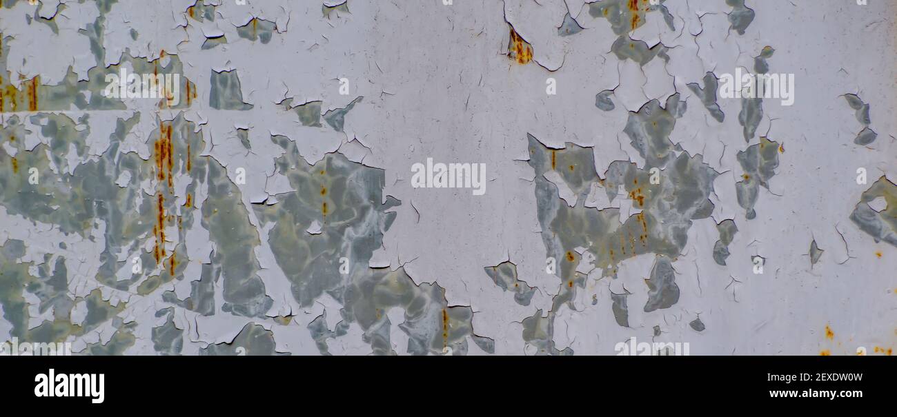 Old metal textured background with peeling paint. Stock Photo