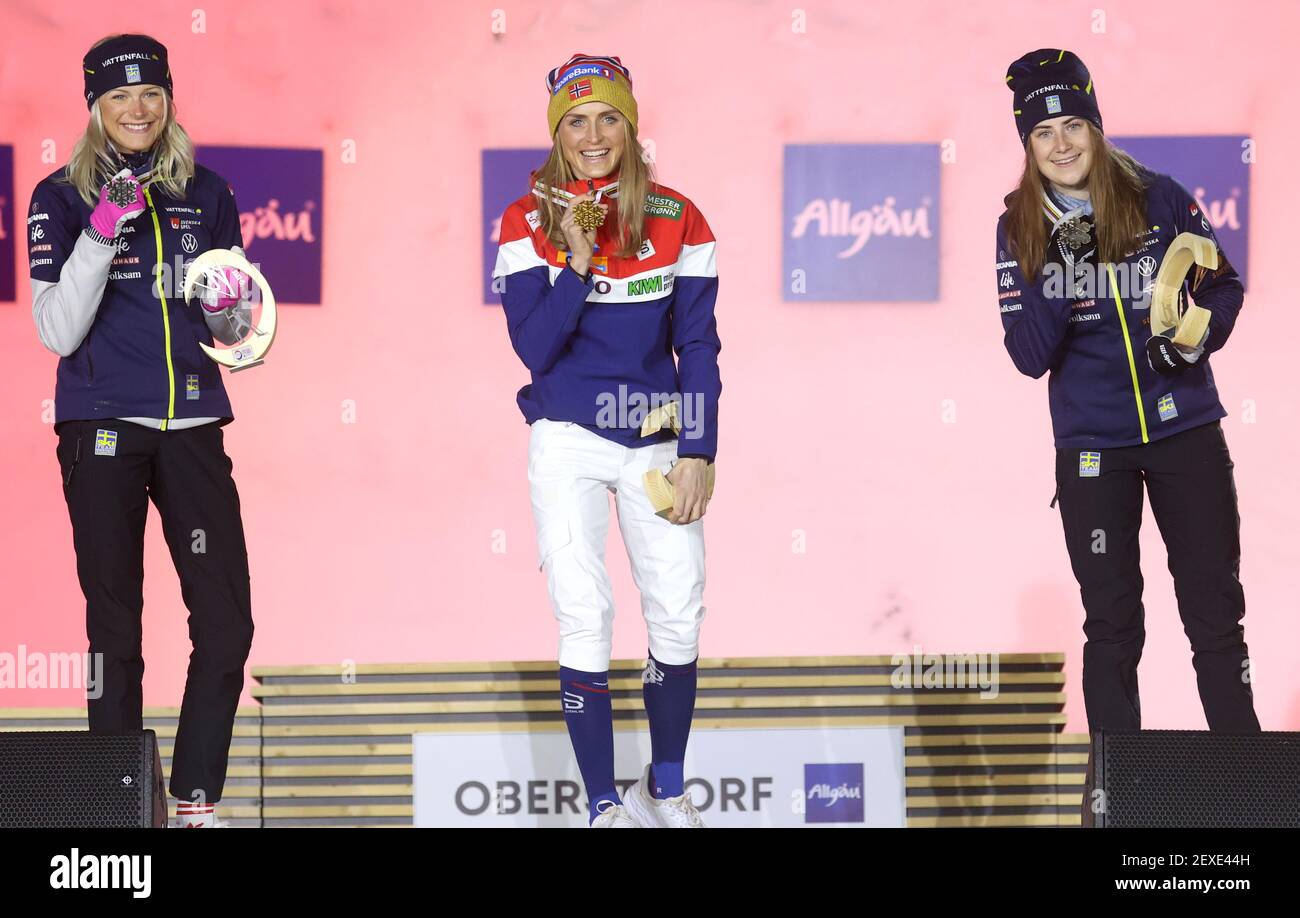 Oberstdorf, Germany. 04th Mar, 2021. Nordic skiing: World Championships,  cross-country skiing - individual. Runner-up Frida Karlsson (l-r) from  Sweden, first-placed Therese Johaug from Norway and third-placed Ebba  Andersson from Sweden are on