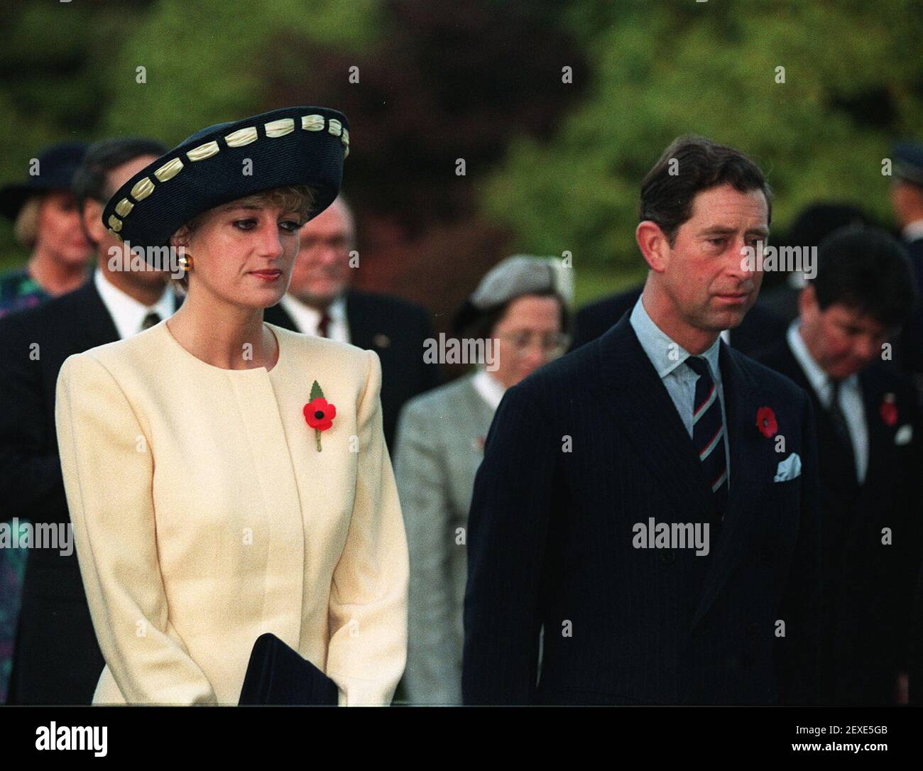 File photo dated 02/11/92 of the Prince and Princess of Wales stand during a visit to the national cemetery in Seoul. As the bitter fallout from Megxit worsens, the monarchy's troubles have been labelled the War of the Waleses 2.0. Stock Photo