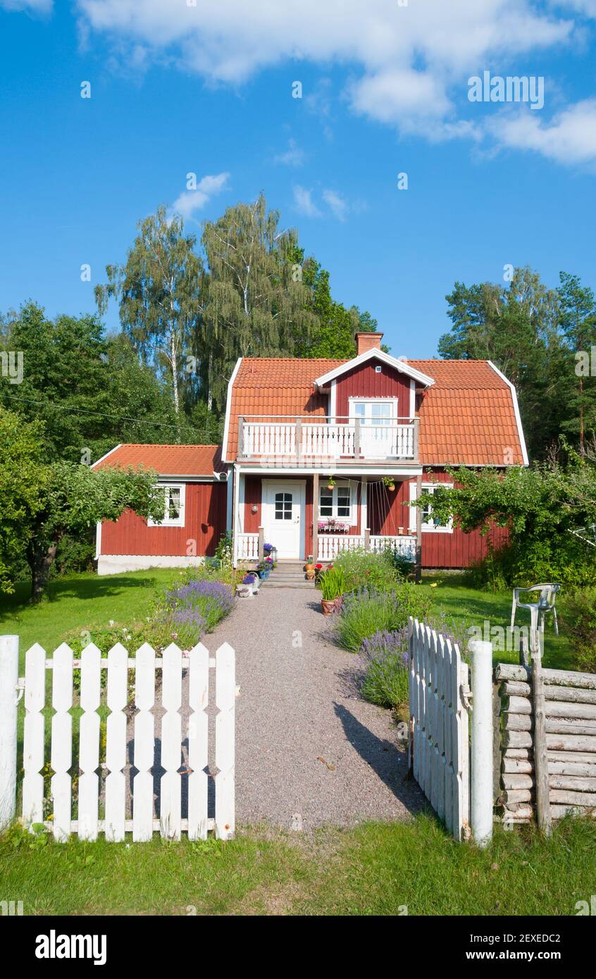 Red painted Swedish house Stock Photo
