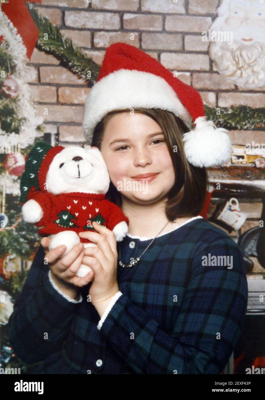 21 May 2015. Laurel, Mississippi. Collect photos of plus size model Tess Holliday (formerly known as Tess Munster, nÃ©e Ryann Hoven) in her formative years from a family album. Christmas photo of a young Tess. Photo credit; Tadlock Charley Varley *** Please Use Credit from Credit Field *** Stock Photo