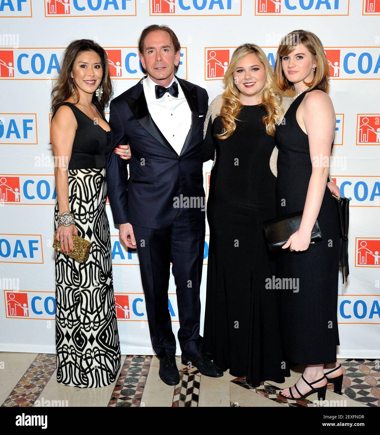 L-R: Lesley Furuta, Larry Feinberg, Samantha Feinberg and Caroline Curtis attend The Children of Armenia Fund 12th Annual Holiday Gala at Cipriani 42 in New York, NY on December 11, 2015. (Photo by Stephen Smith) *** Please Use Credit from Credit Field *** Stock Photo