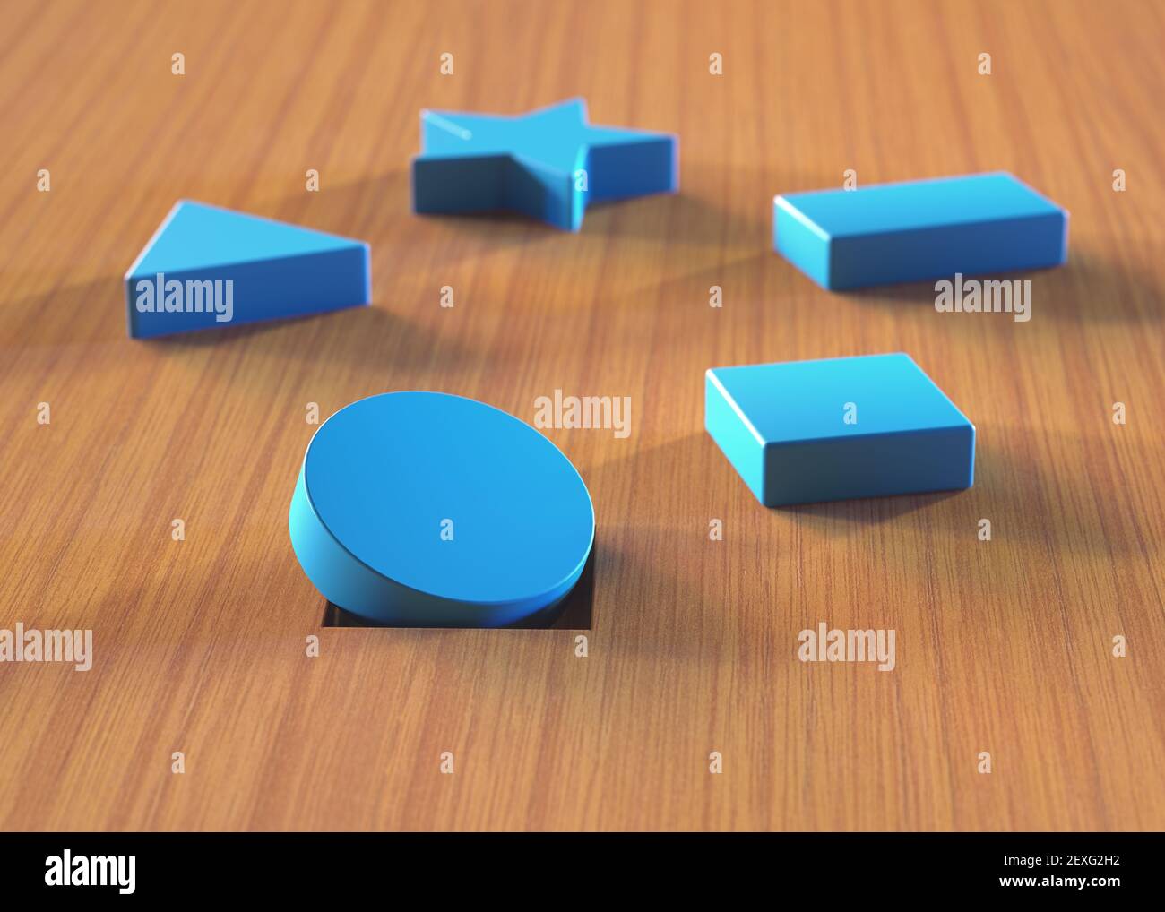 Wrong piece in the hole. Assorted blue blocks on wooden table. Educational toy and psychological test. Stock Photo