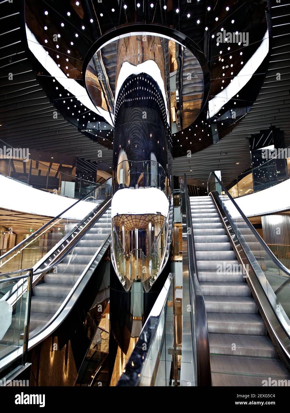 Indoor landscape, shopping escalator and glass roof of modern shopping mall  in Vientiane City, Zhengzhou, Henan Province Stock Photo - Alamy