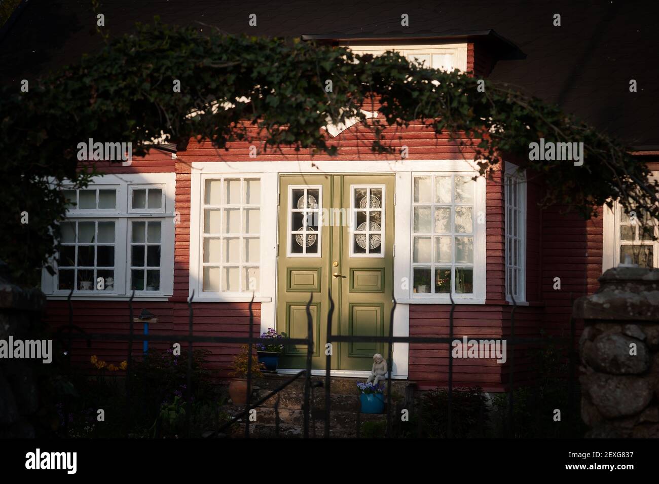Front door of a swedish cottage at night Stock Photo