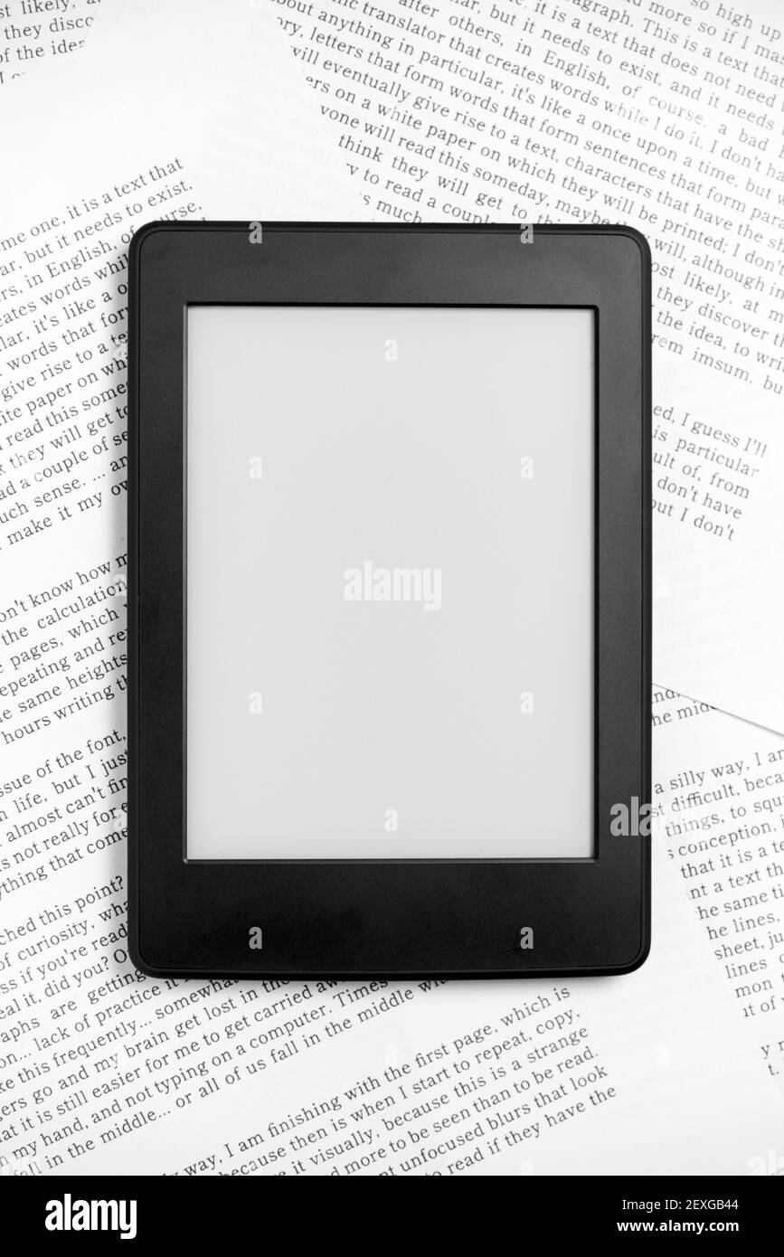 Electronic reader off on sheets of paper with text printed on them