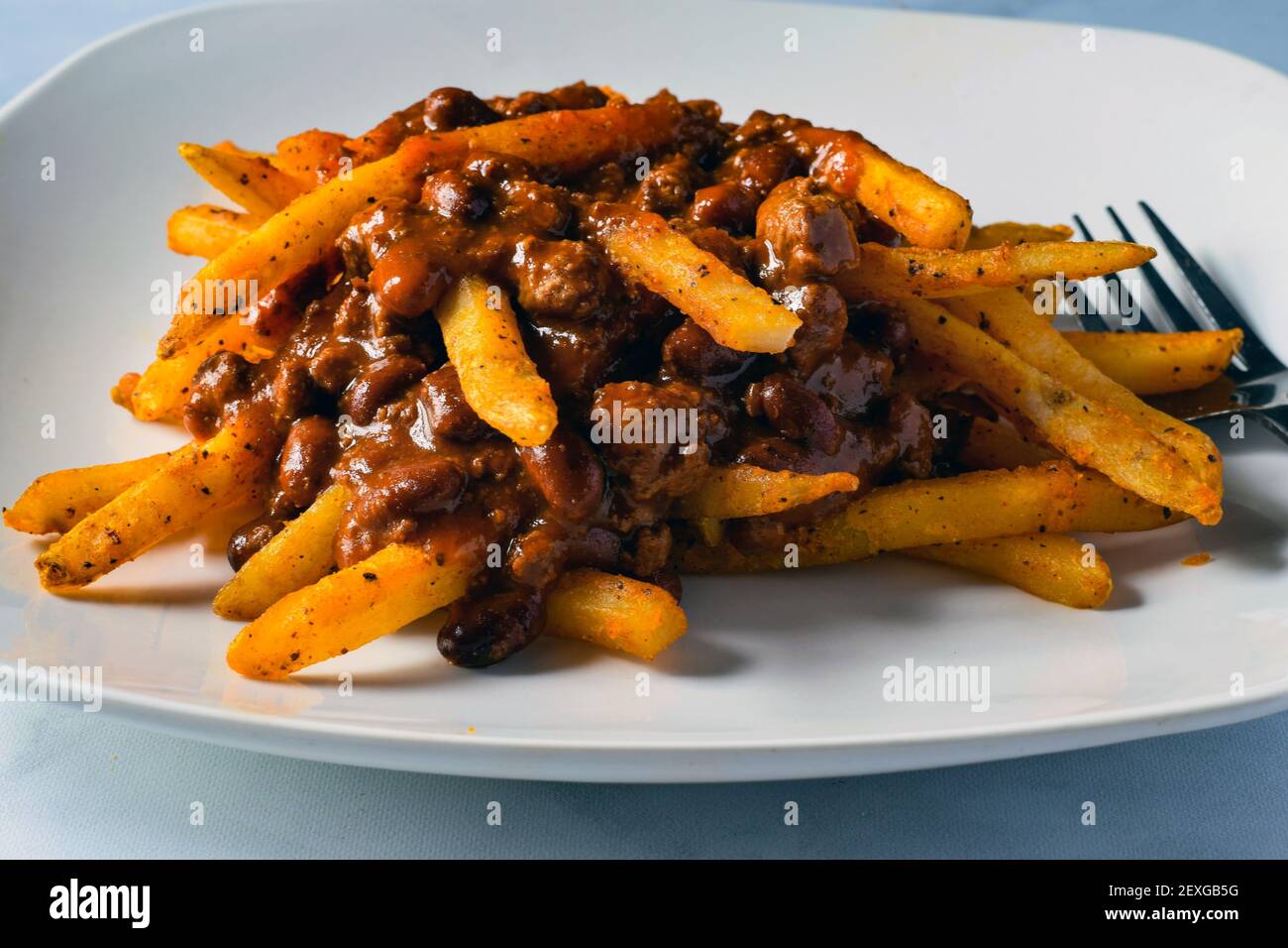 tuna roll served with a side of french fries Stock Photo Alamy