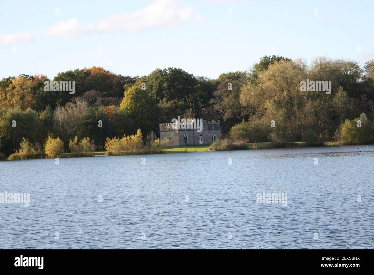 The Lake at Kiplin Hall in Yorkshire near Richmond showing the view across the lake and the Halls Summer house Stock Photo