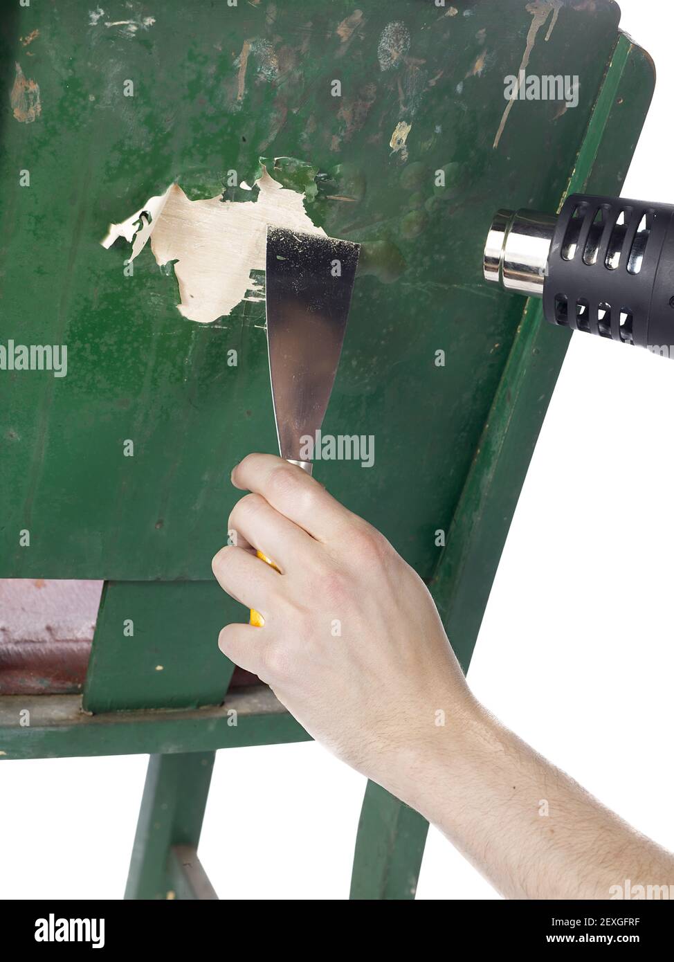 Removing paint by heat gun and chisel Stock Photo Alamy