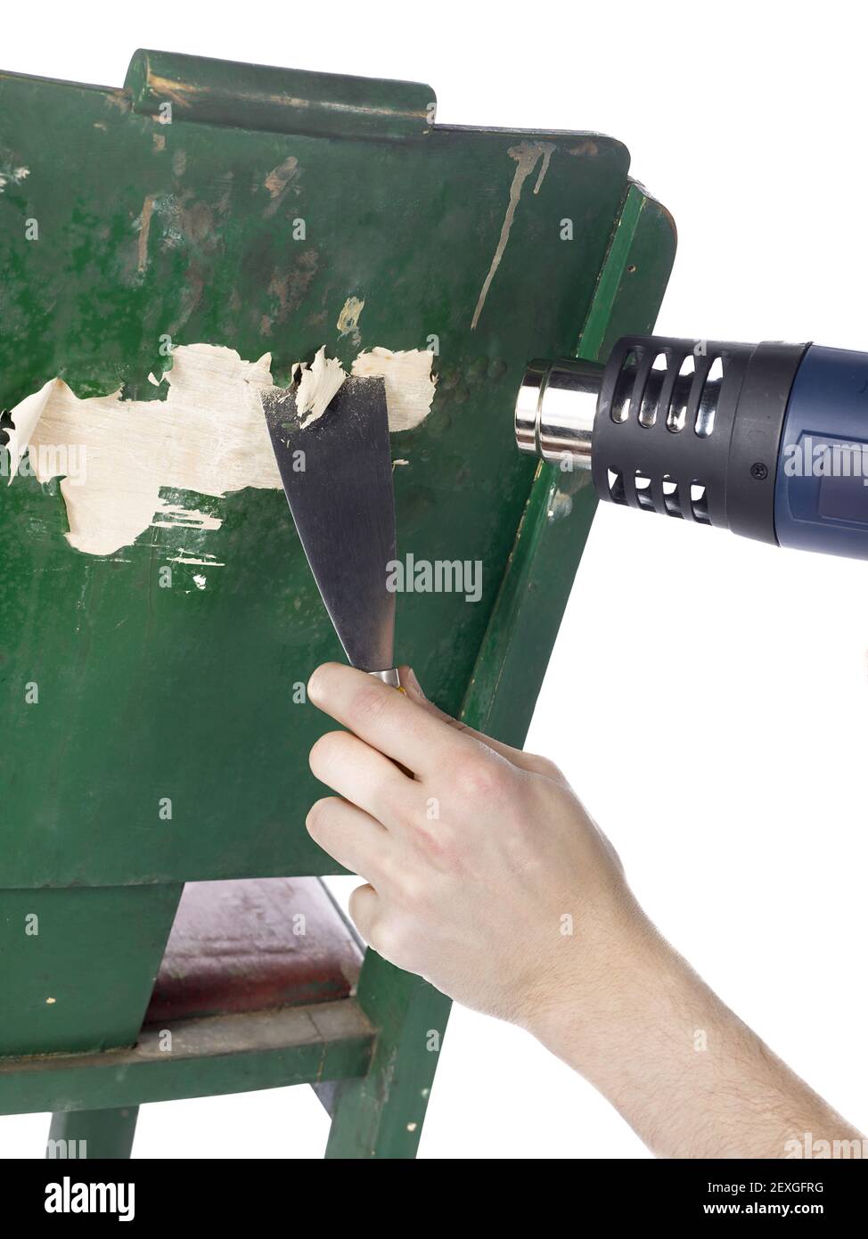 Removing paint using a heat gun and trowel Stock Photo Alamy