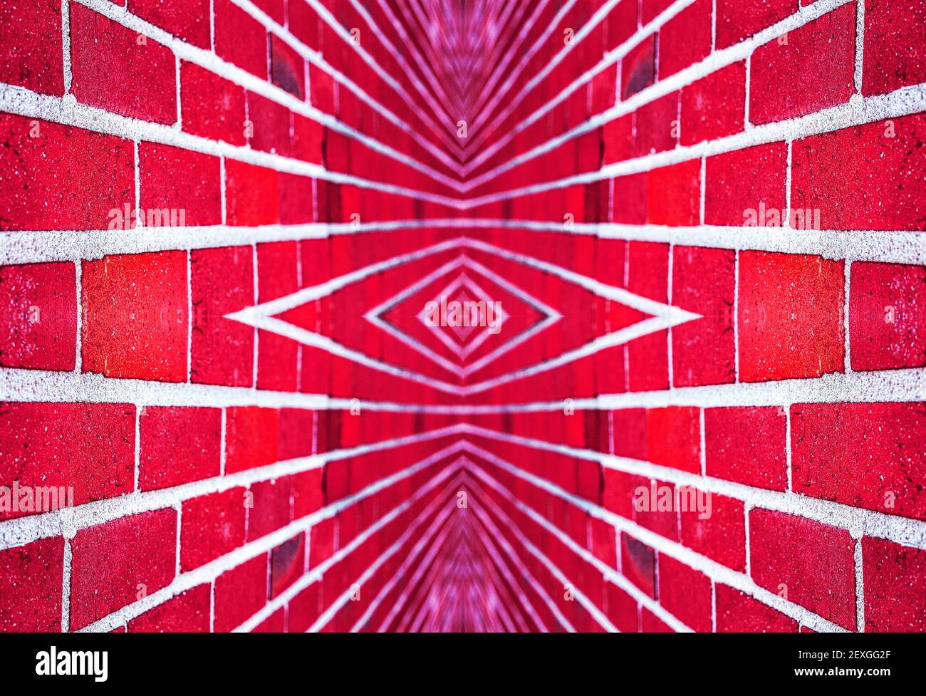 A brick wall is turned into a symmetric optical illusion, with composite photography Stock Photo