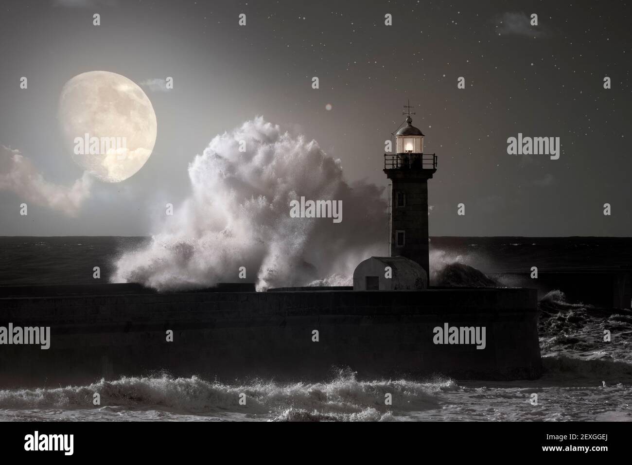 Old lighthouse in a stormy night Stock Photo - Alamy