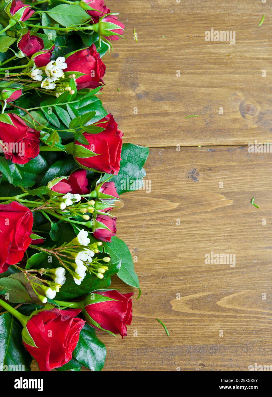 Rustic background with roses Stock Photo - Alamy