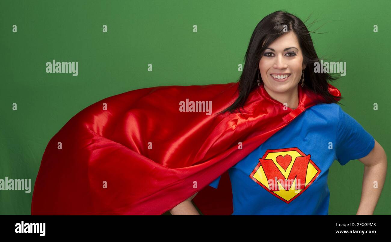 Proud Mom as Super Mother on Green Screen Stock Photo