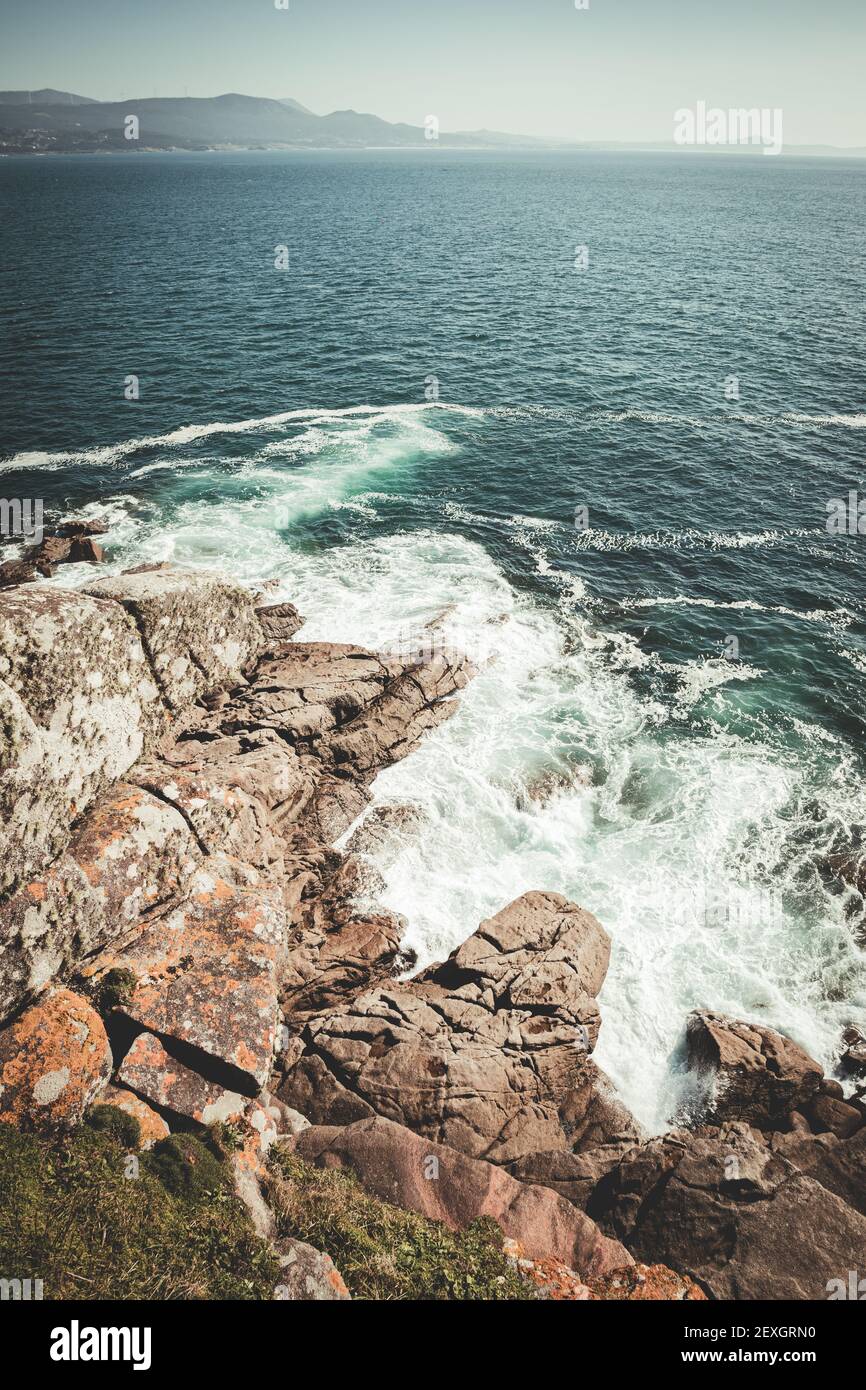 Aerial view of the sea against the rocks Stock Photo