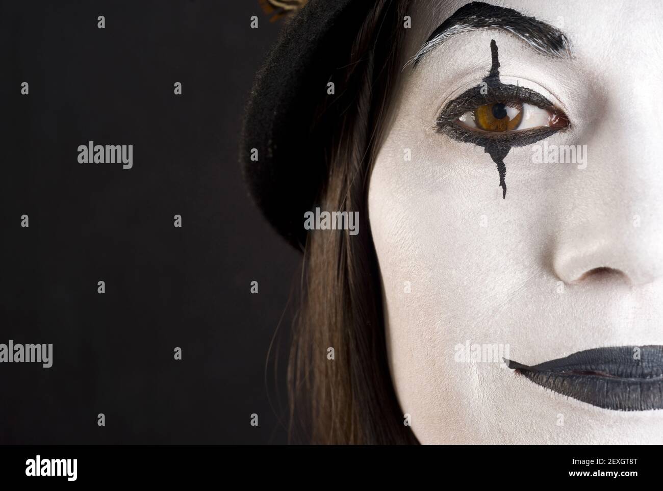 young woman with body painting on her face, ugly scary clown, Halloween  topic Stock Photo - Alamy